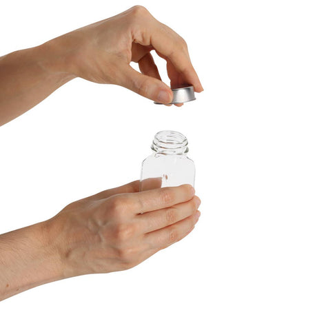 Bamboe kruidenrek met 11 glazen potjes – compact keuken organizer.